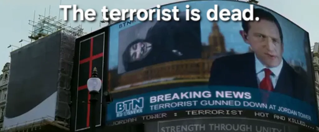 A large outdoor billboard displays a news broadcast from 'BTN' with a breaking news banner stating 'TERRORIST GUNNED DOWN AT…