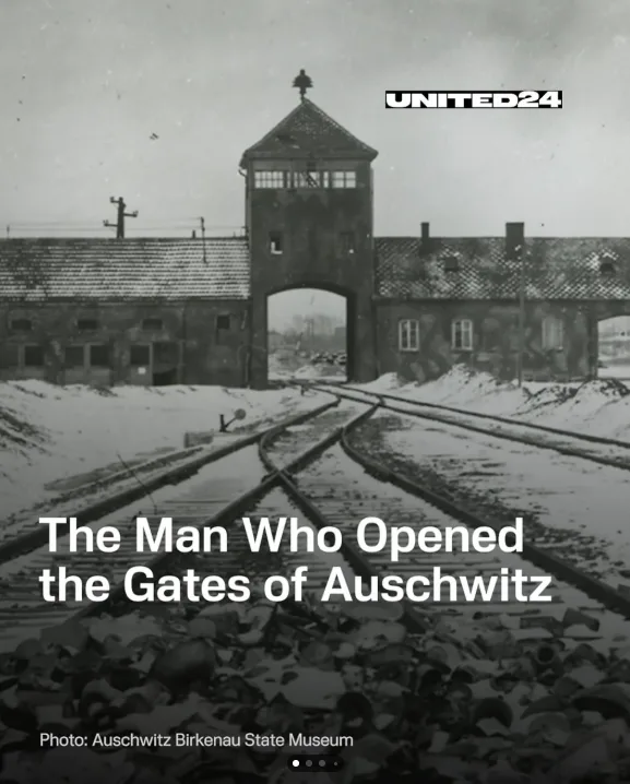 A black-and-white historical photograph shows the main gate of Auschwitz concentration camp, with snow-covered ground and…