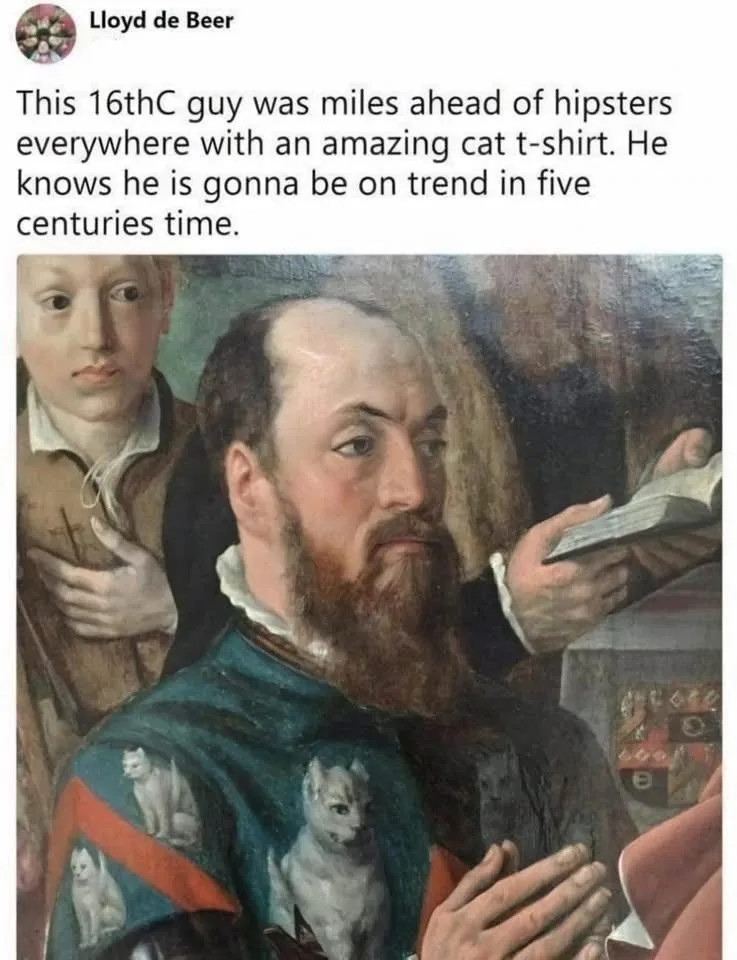 A 16th-century oil painting depicts a bearded man in a dark green and red garment adorned with multiple white cat…