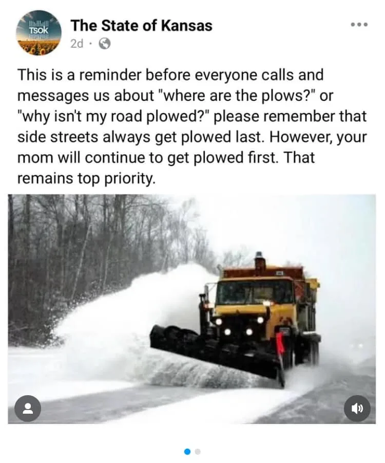 A screenshot of a Facebook post from 'The State of Kansas' shows a yellow snowplow pushing snow on a road. The overlaid text…