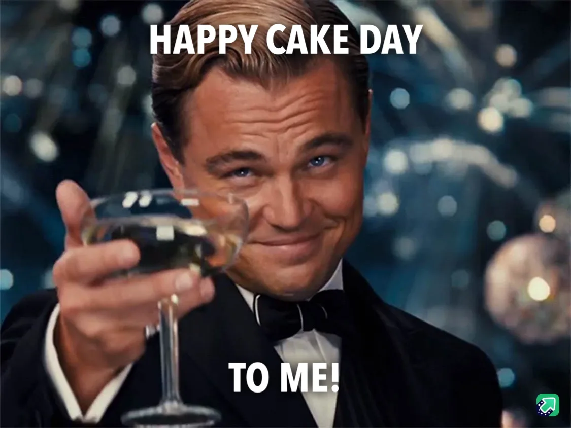 A man in a tuxedo holding a champagne glass and smiling while toasting, with the text 'HAPPY CAKE DAY' at the top and 'TO…