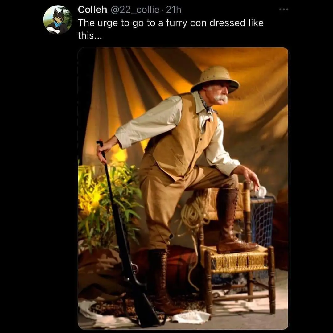 A man in a vintage safari outfit, complete with pith helmet, vest, and tall boots, leans on a cane while seated on a wicker…
