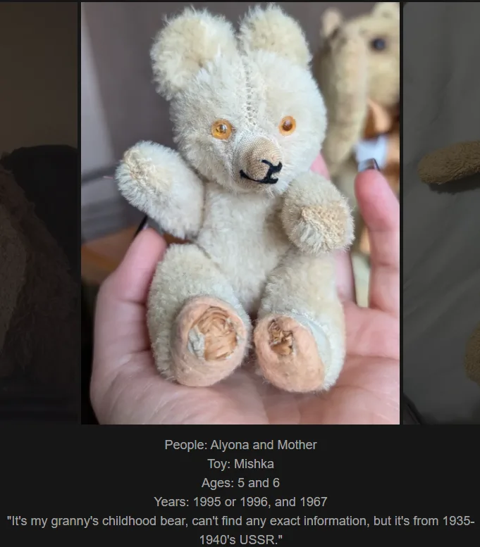 A close-up photo shows a small, worn, beige teddy bear with orange button eyes and black stitched nose, held in a person's…