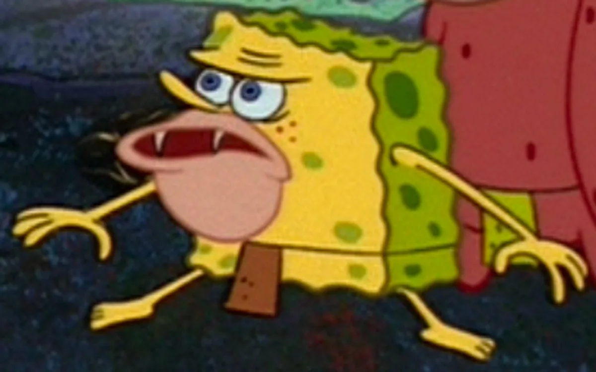 a close-up of the cartoon character spongebob squarepants with a terrified expression, wide eyes, and fangs visible, wearing…