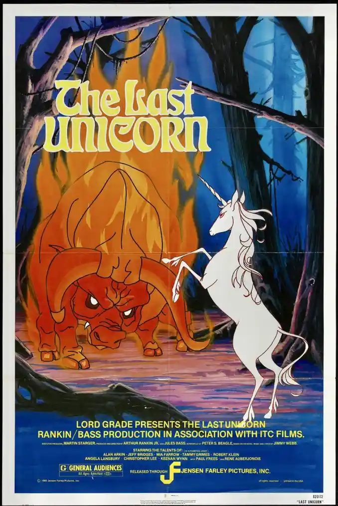 This is a movie poster for 'The Last Unicorn' featuring a white unicorn standing on its hind legs facing a large, fiery…