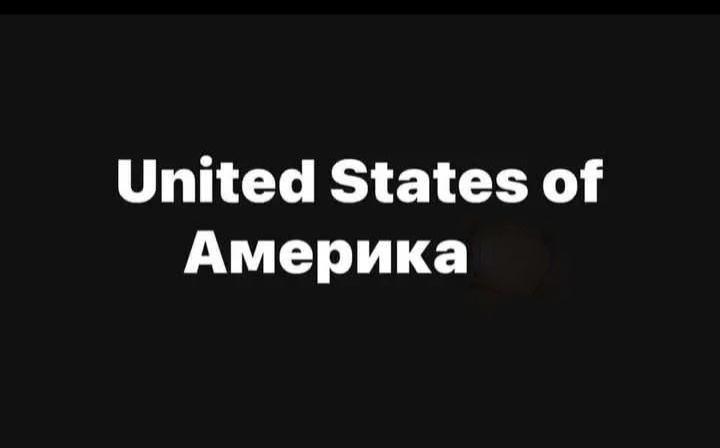 A black background with white text reading 'United States of Америка', where 'Америка' is the Cyrillic spelling of…