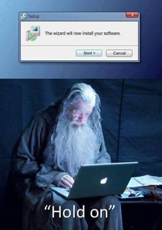 An image of Gandalf the Grey from Lord of the Rings, looking intently at a laptop, overlaid with a Windows software…