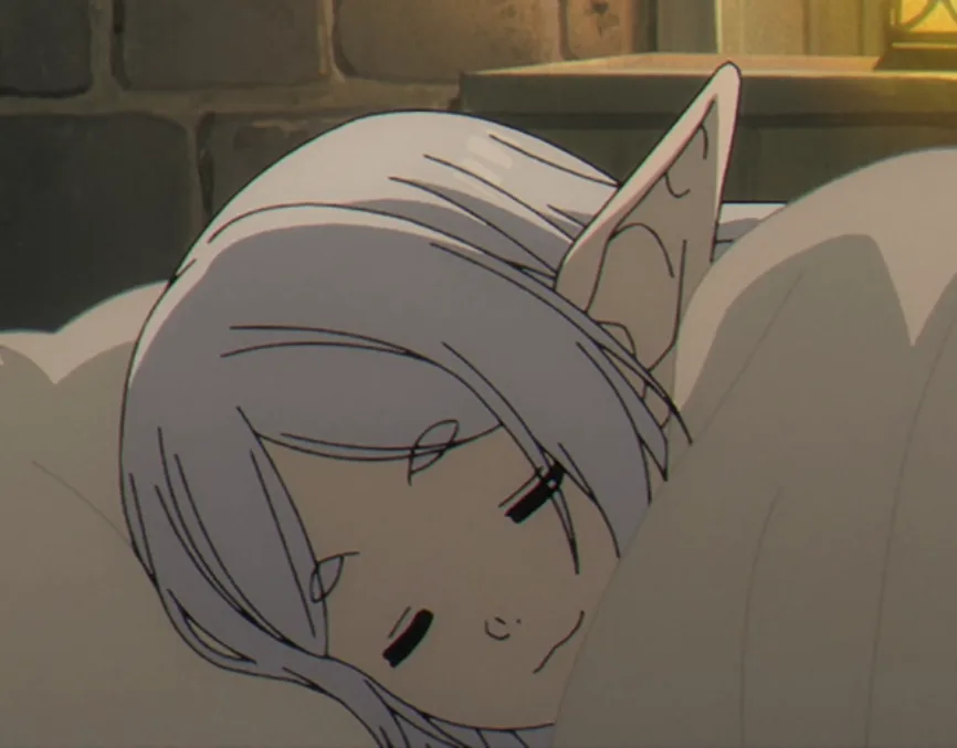 An anime character with silver hair and pointed ears is shown resting their head on a pillow, eyes half-closed with a tired…