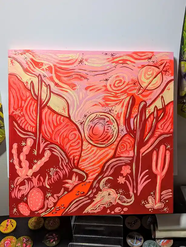 A vibrant, stylized painting depicts a desert scene with cacti, a skull, and swirling red and pink skies with stars and…