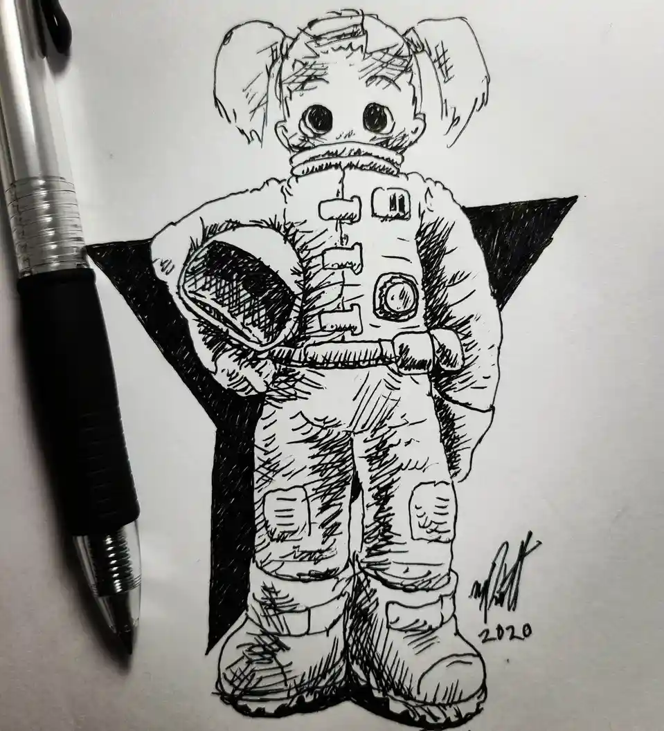 A black-and-white ink drawing on paper shows a stylized, cartoonish astronaut with large, round eyes and a helmet, standing…