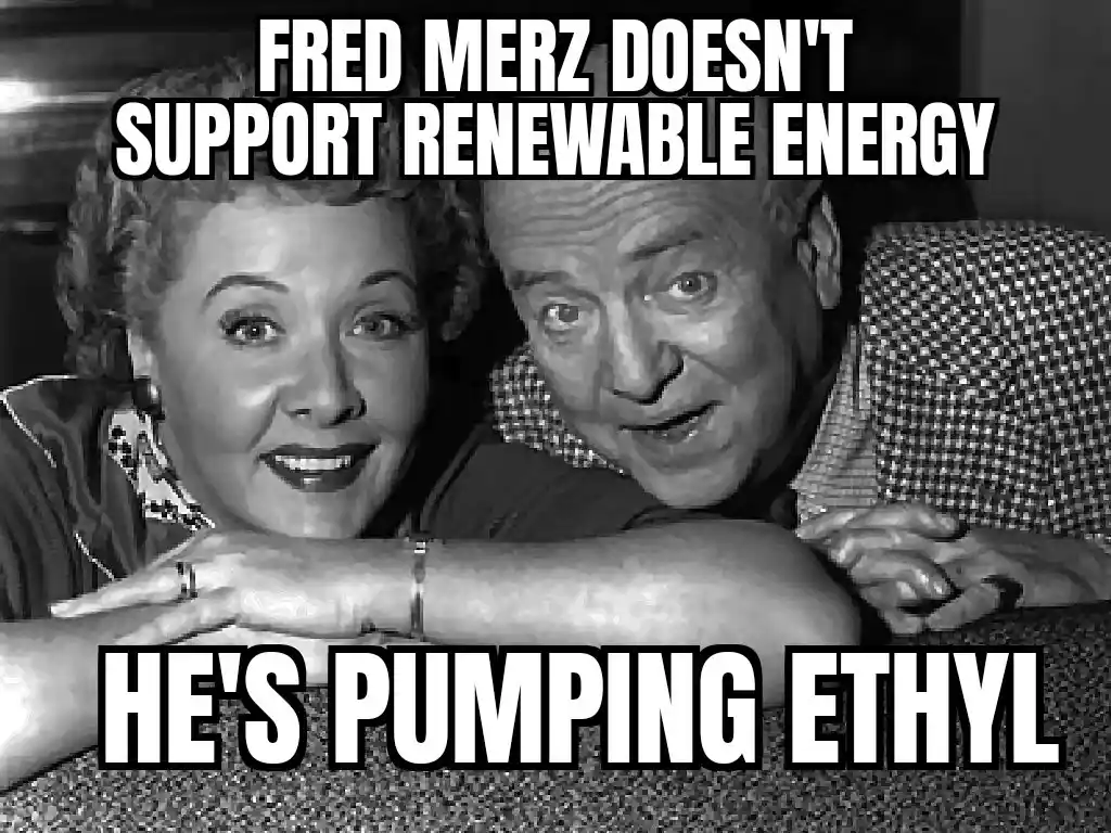 A black-and-white photo of a smiling man and woman leaning forward, overlaid with bold white text stating 'FRED MERZ DOESN'T…