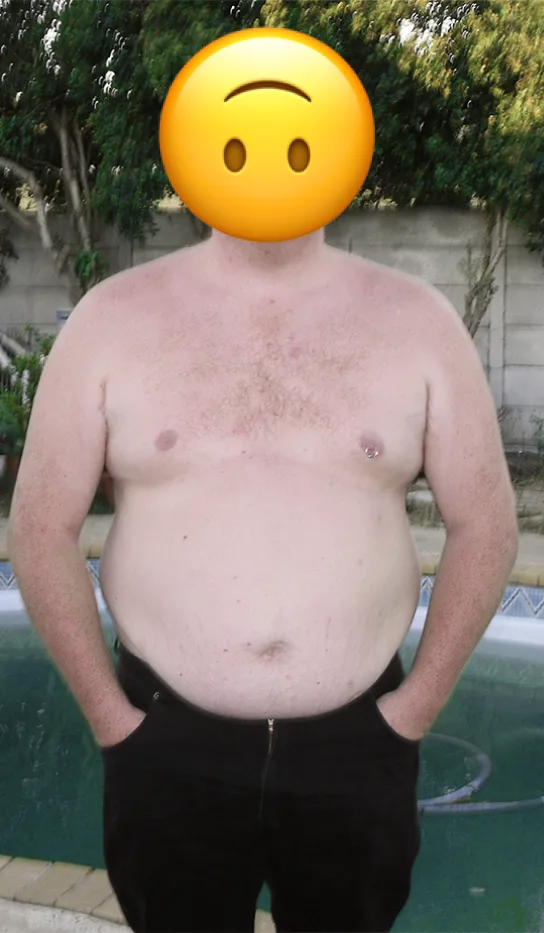 A shirtless man with a large belly stands by a pool with his hands in his pockets. His face is obscured by a yellow sad…