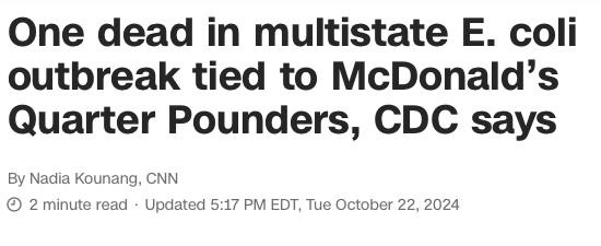 A screenshot of a CNN news article headline reads 'One dead in multistate E. coli outbreak tied to McDonald’s Quarter…