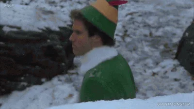 A split-screen image shows a man in a green elf costume with a striped hat looking left and right, while the right side…