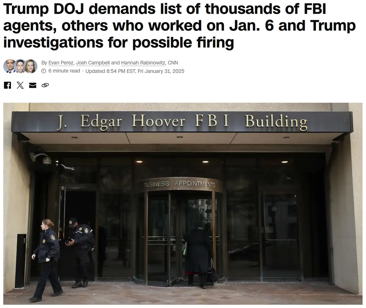 The image shows the entrance to the J. Edgar Hoover FBI Building, featuring a revolving door labeled 'BUSINESS APPOINTMENTS'…