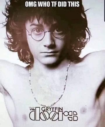 A black and white photo of a young man with curly hair and glasses, shirtless and wearing a necklace, looking directly at…