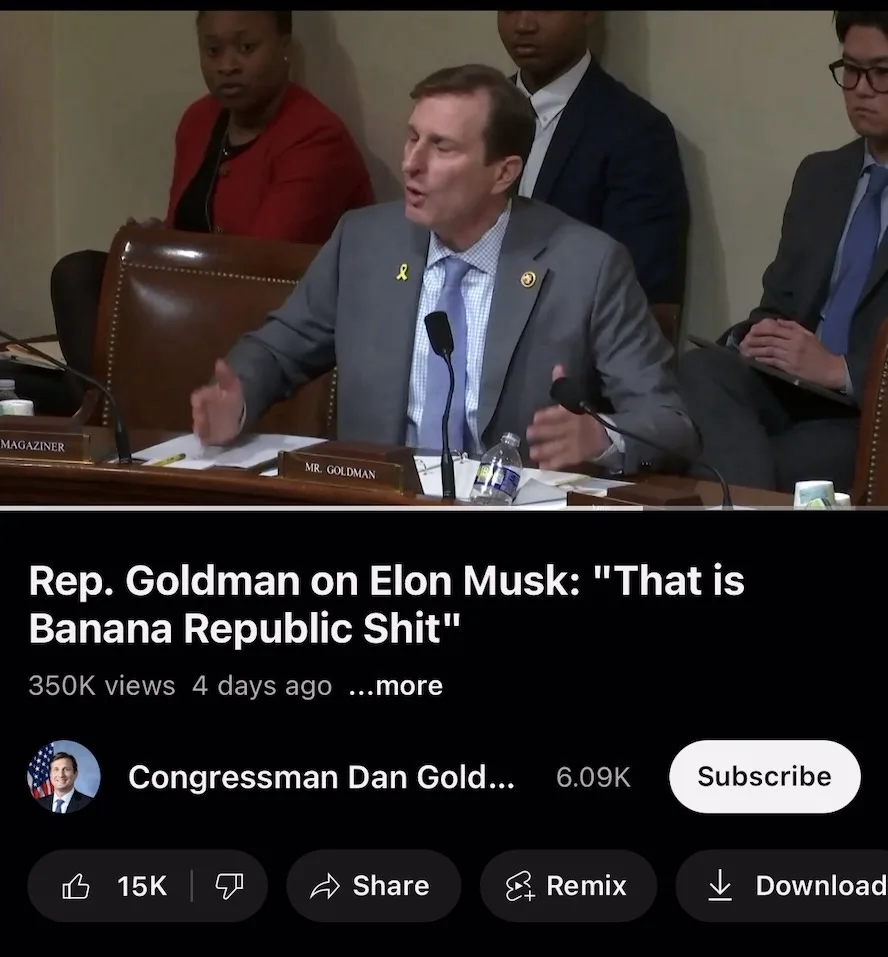 A still from a YouTube video shows Rep. Dan Goldman speaking at a congressional hearing, gesturing with both hands while…