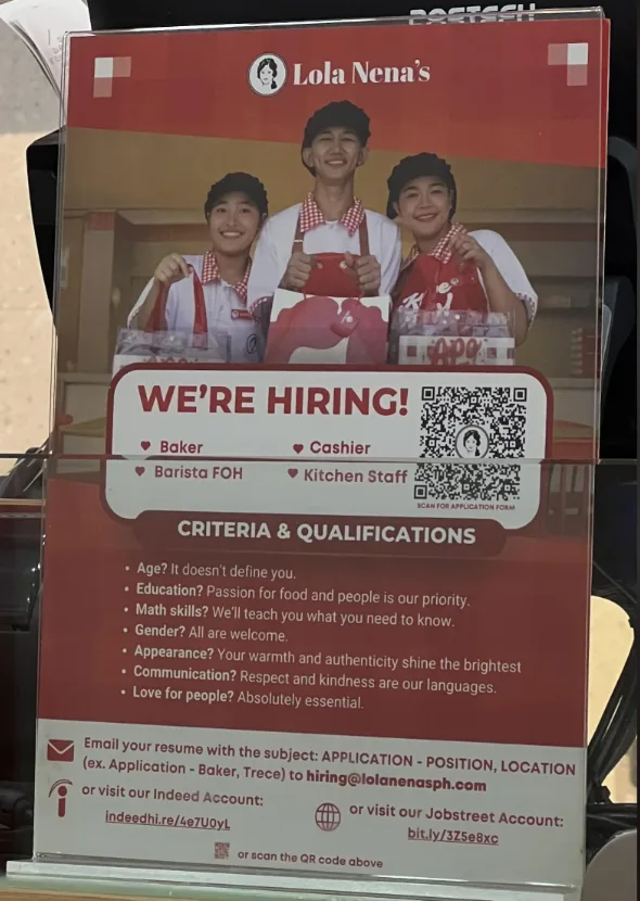 A red hiring poster for 'Lola Nena's' features three smiling staff members in red and white uniforms holding trays. The…