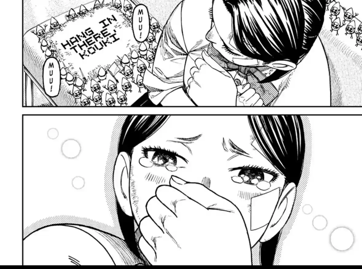 A manga panel shows a character in a bowtie looking down at a cake with tiny cartoon figures cheering and shouting 'MUU!'…