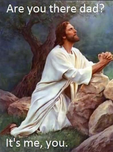 A painting depicts Jesus kneeling on rocks outdoors, wearing a white robe, with hands clasped in prayer and head tilted…