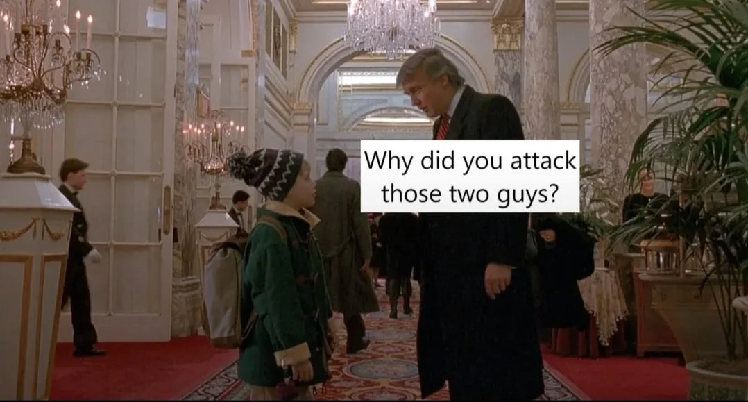 A young boy in a winter hat and green coat stands facing a tall man in a suit inside an ornate, chandelier-lit hallway. The…