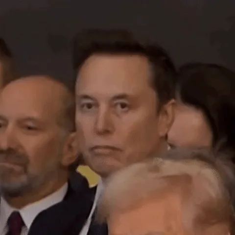 A six-panel grid shows elon musk in an audience, transitioning from a neutral expression to looking upward with a bored or…