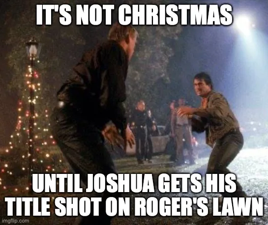 Two men are in a tense, confrontational stance outdoors at night, with a lit Christmas tree visible to the left. The man on…