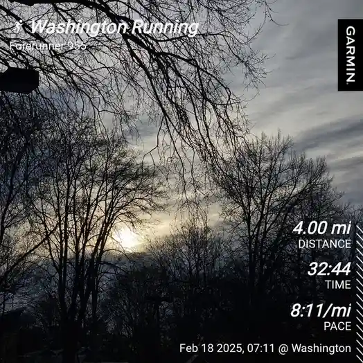 A screenshot of a Garmin Forerunner 955 running watch displaying a 4.00-mile run completed in 32:44 at an 8:11/mi pace…