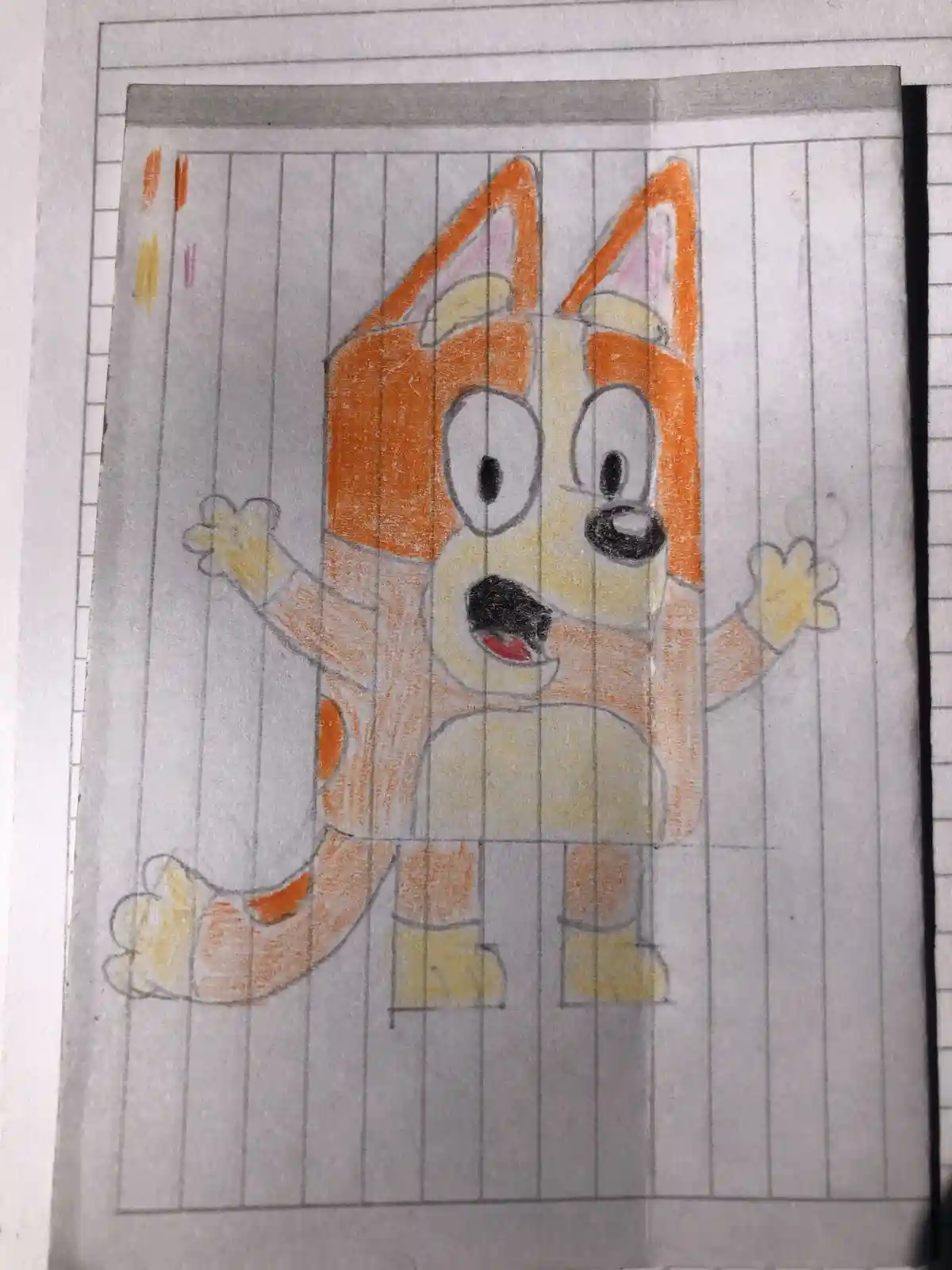 A child's crayon drawing of the cartoon character Bluey on lined notebook paper, with the character's face and body visibly…