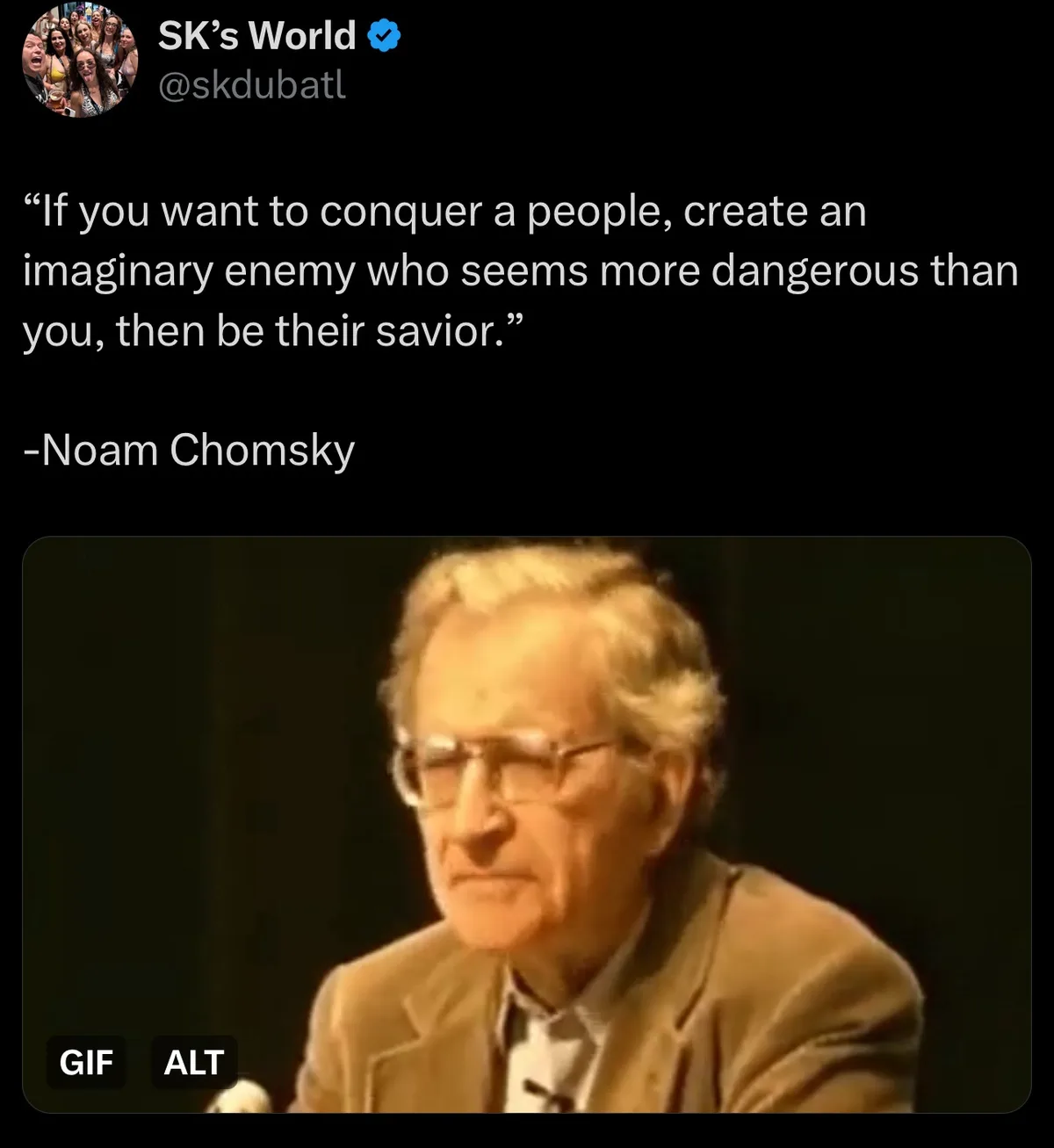 A screenshot of a tweet by 'SK's World' (@skdubatl) displays a quote attributed to Noam Chomsky: 'If you want to conquer a…