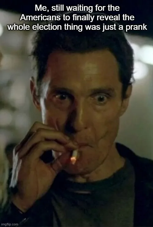 A close-up shot of actor Matthew McConaughey with a shocked, wide-eyed expression, holding a lit cigarette near his mouth…