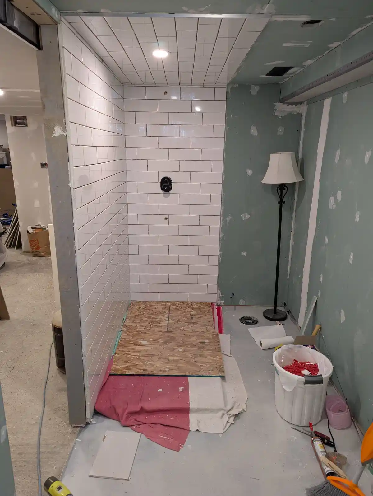 DIY Shower Project Update: Tiles are in, grout is next!
