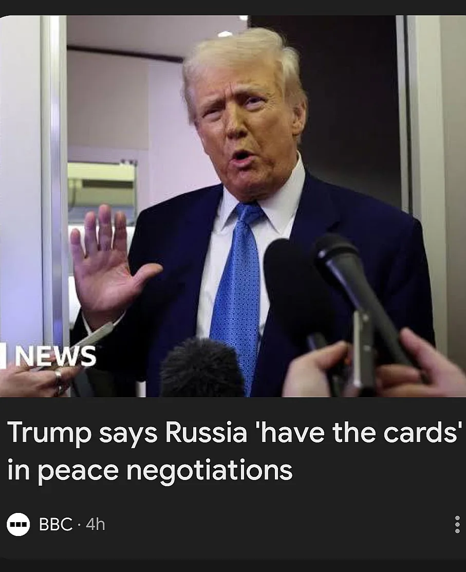 A still image of Donald Trump speaking to reporters, gesturing with his right hand, surrounded by microphones. The image is…