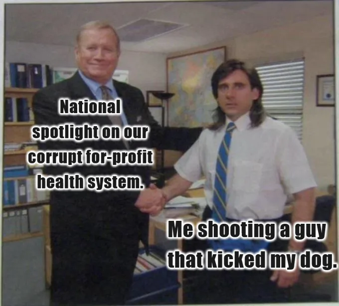 Two men in an office setting are shaking hands. The man on the left, wearing a dark suit, has text overlaid that reads…