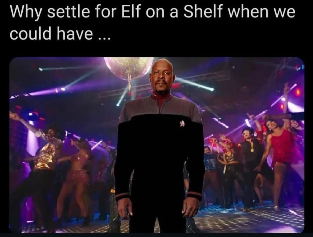 A man in a Star Trek uniform stands still in the center of a vibrant, crowded disco scene with a disco ball above and…