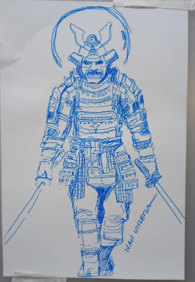 A blue ink sketch on white paper depicts a heavily armored samurai warrior with a menacing expression, holding two swords…
