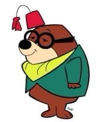 A cartoon brown dog wearing a red fez, black-rimmed glasses, a green jacket, and a yellow scarf stands with one hand on its…