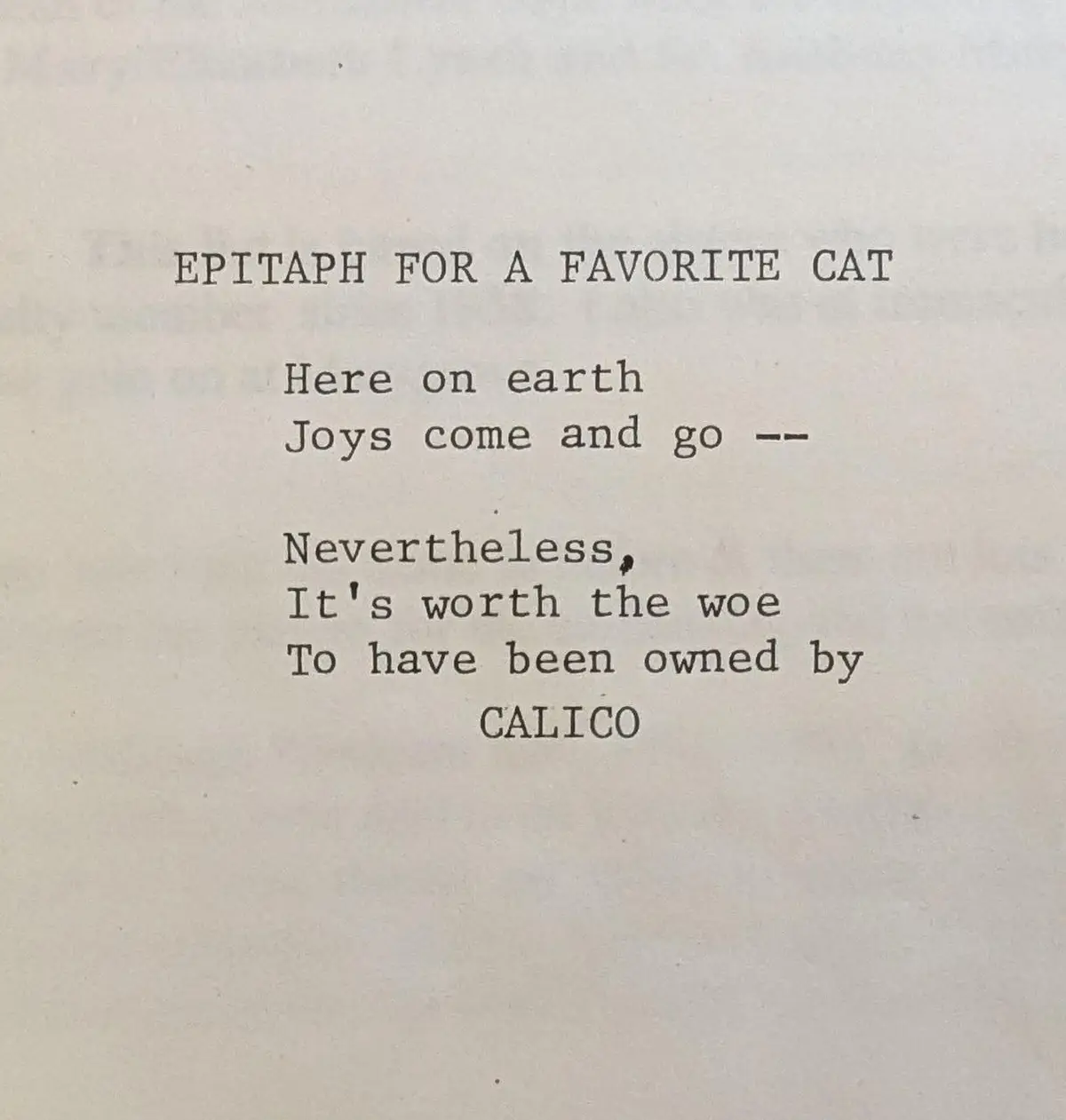 The image displays typewritten text on aged paper, styled as a humorous epitaph for a cat named Calico. The text reads…