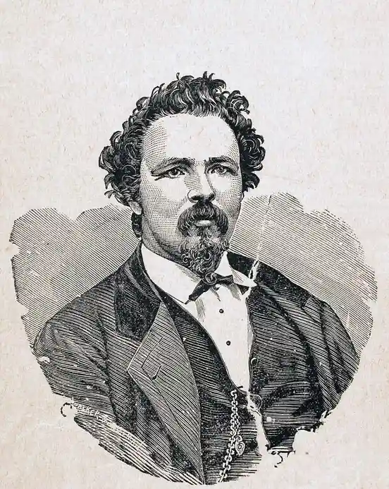 A vintage black-and-white engraved portrait of a man with curly hair and a beard, wearing a formal suit and bow tie, looking…