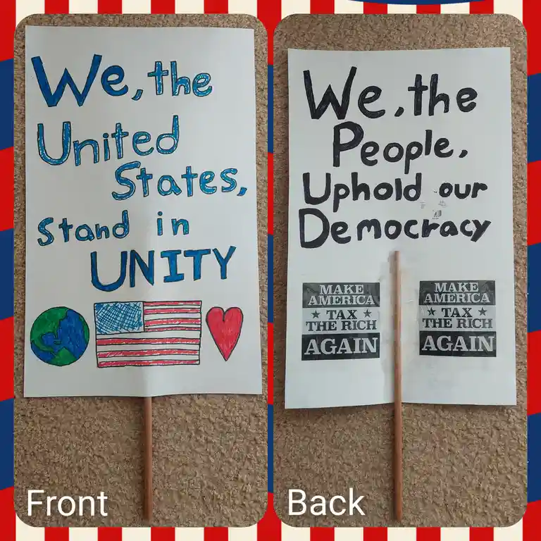 Two handmade protest signs are shown side-by-side, labeled 'Front' and 'Back'. The front sign reads 'We, the United States…