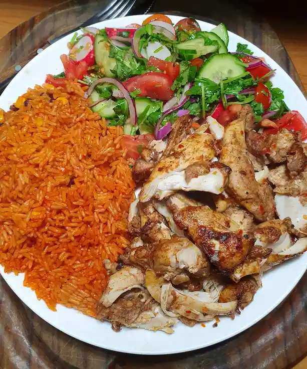 Low-calorie chicken Hairryssa served with rice and salad, yum!