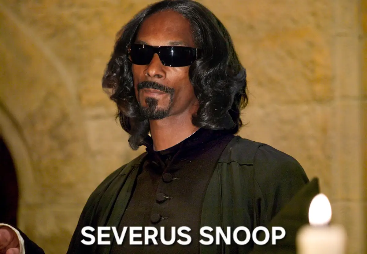 A man with long black hair, sunglasses, and a goatee wears a dark robe in a stone-walled setting, with a lit candle visible…