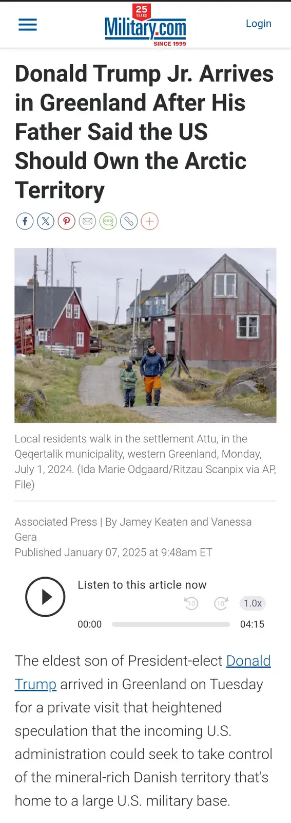 A screenshot of a Military.com news article shows a photo of two people walking on a gravel path between red and blue wooden…