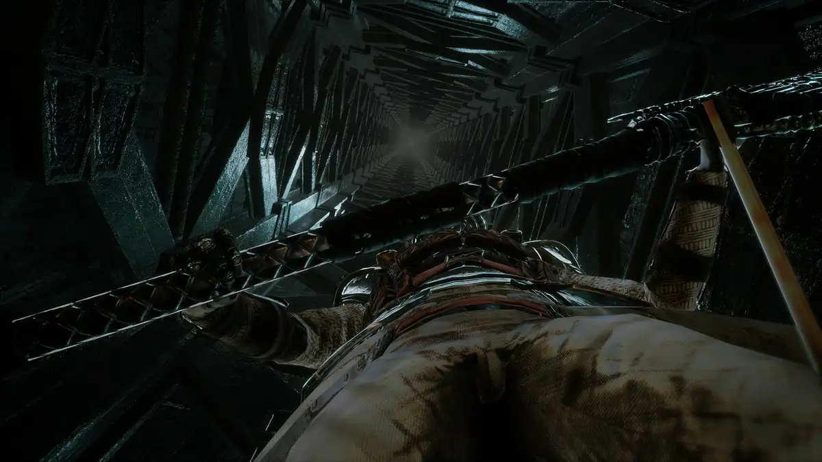 A first-person view from a video game shows a character lying on their back in a dark, narrow, geometrically patterned…