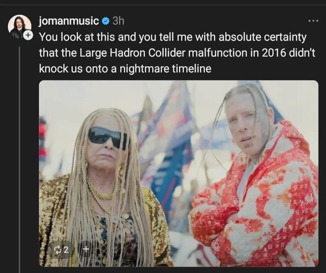 The image shows two people standing side by side; the person on the left is an older woman with long blonde braids, wearing…