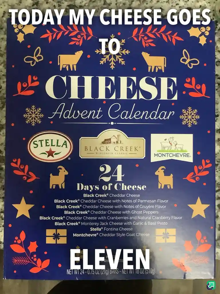 A blue cheese advent calendar box with festive red and gold decorations, featuring logos for Stella, Black Creek, and…