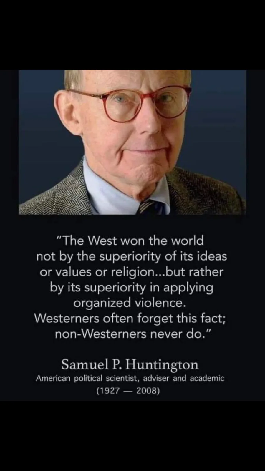 A portrait of Samuel P. Huntington, an older white man with glasses, wearing a tweed jacket and tie, looking directly at the…