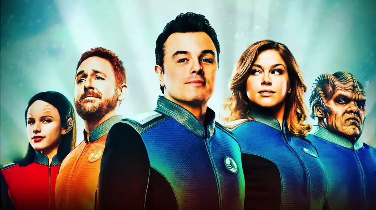 a promotional poster for the tv show 'Star Trek: Discovery' featuring five main characters in their uniforms against a…
