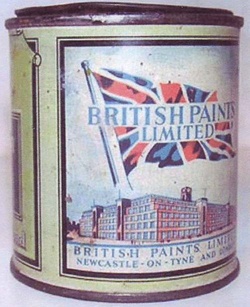 A vintage cylindrical paint can labeled 'BRITISH PAINTS LIMITED' with a faded Union Jack flag waving above a factory…