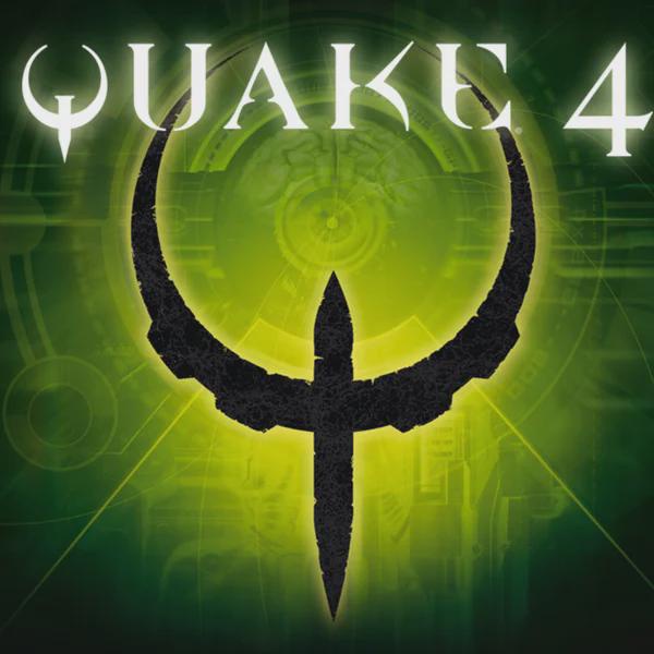 The image displays the official logo for the video game Quake 4, featuring a stylized black symbol resembling a crescent…